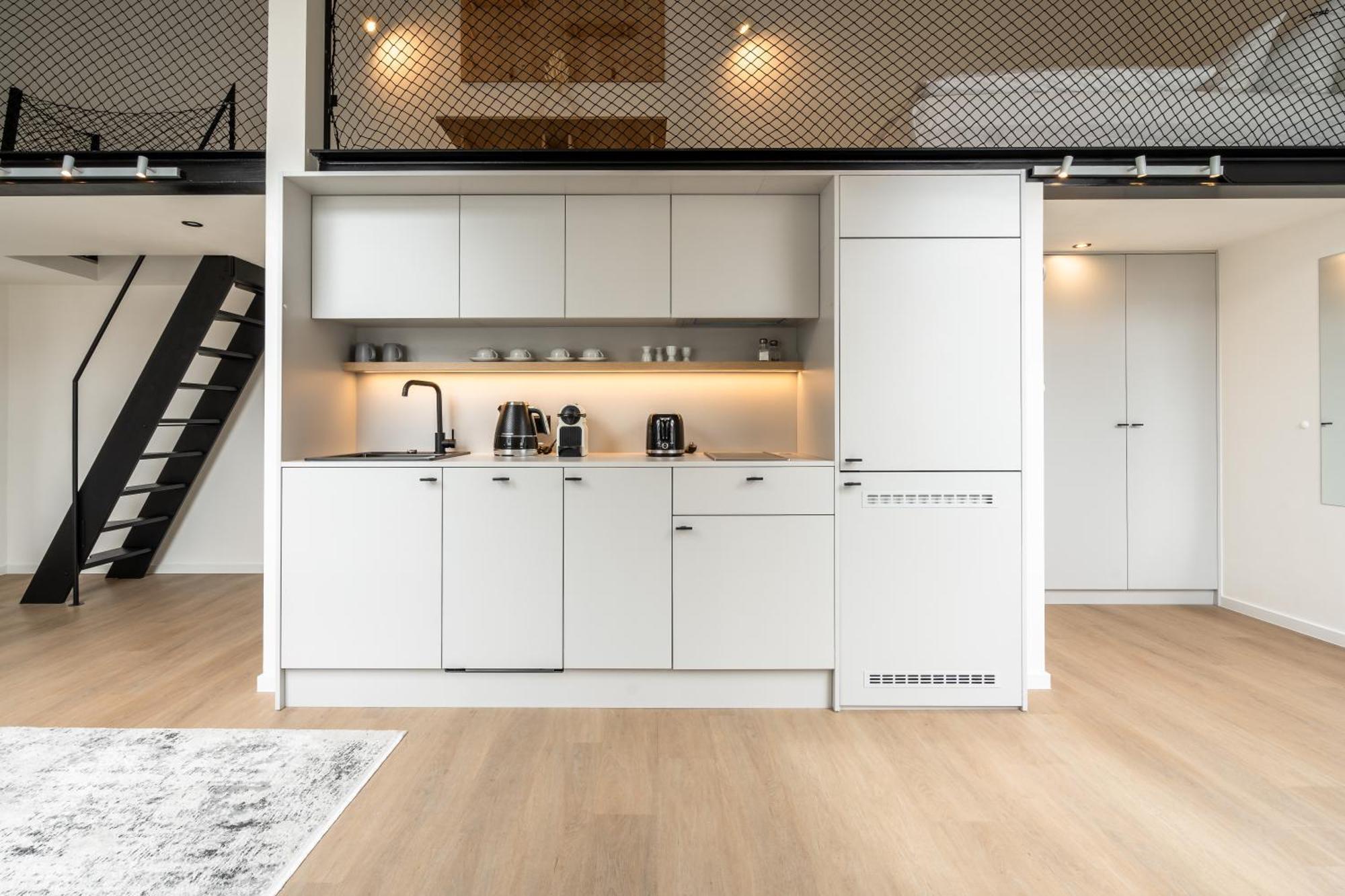 プラハ Honest Karlinアパートホテル 部屋 写真